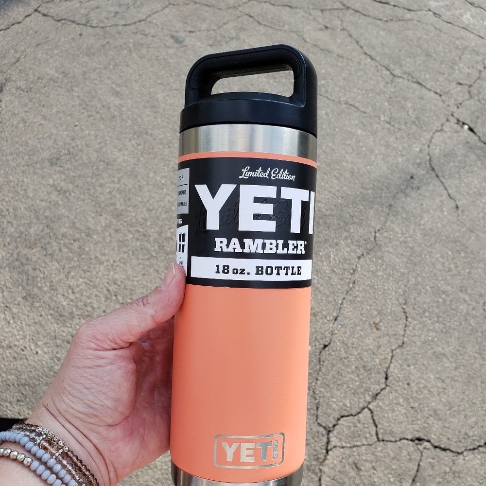 Orange/peachy colored yeti tumbler